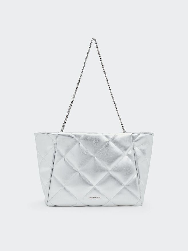 华泰名品城推「Charles & Keith Apfra菱格炼条托特包」，原价3190元、特价2230元。（华泰名品城提供）