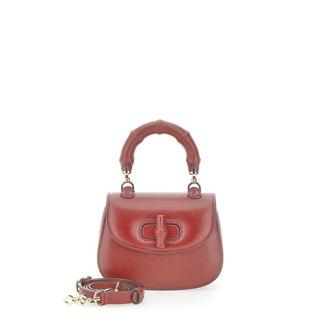 Gucci暗红色Bamboo迷你手提包， 14万9700元。（Gucci提供）