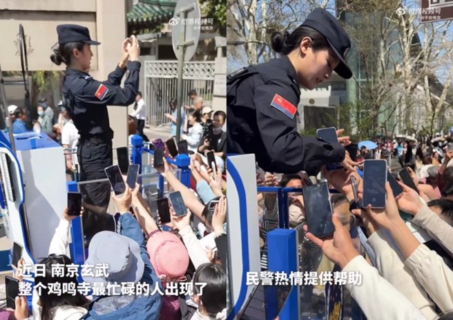 大陆鸡鸣寺的一名正妹女警，因为站点拍风景照超美，民眾纷纷拿出手机要求帮忙拍照，正美女警变成景区内最忙碌的人。（翻摄微博）