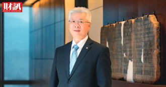 新新併终于过关 幕后关键人物是他