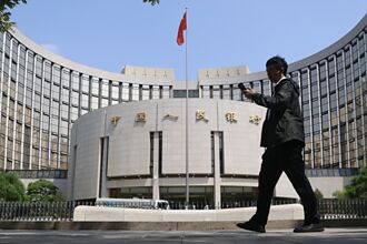 人行報告：實施適度寬鬆貨幣政策