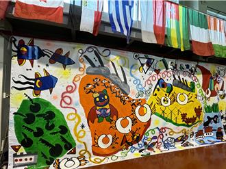 從砲火到畫布 多年國小《和平金門島》壁畫連結世界的心聲