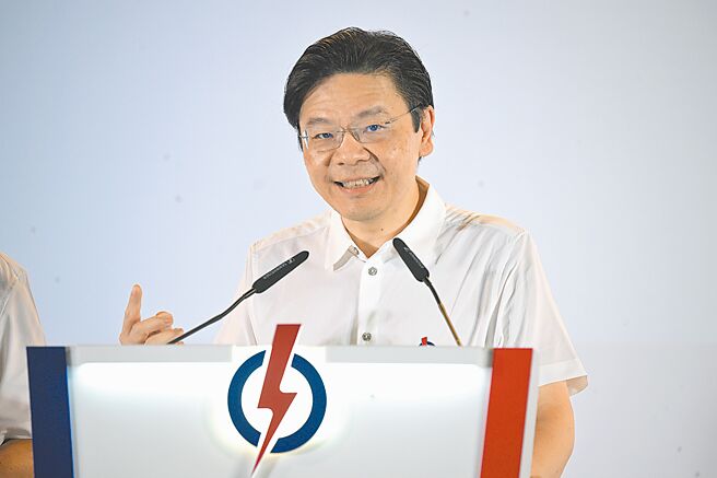 新加坡总理黄循财将于22日至26日对中国进行正式访问，并与大陆国家主席习近平会面。图为黄循财5月4日发表胜选演讲。（新华社）