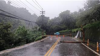 台中新社电线杆断裂躺路中 安妮公主花园前道路封闭