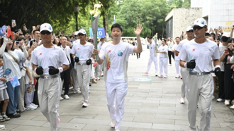 世界運動會首次聖火傳遞  馬龍、李子柒、成龍等接棒