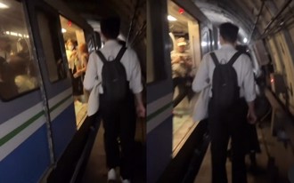 影》文湖線列車卡隧道 乘客摸黑走鐵軌旁畫面曝