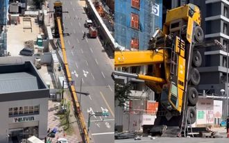 驚悚！吊車翻覆「40公尺吊臂狠砸路面」   路人慘遭擊傷
