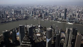 救房市 上海鬆綁限購令