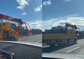 超扯！工程車高速行駛「吊籃內有人」 網友直呼：比較涼快？
