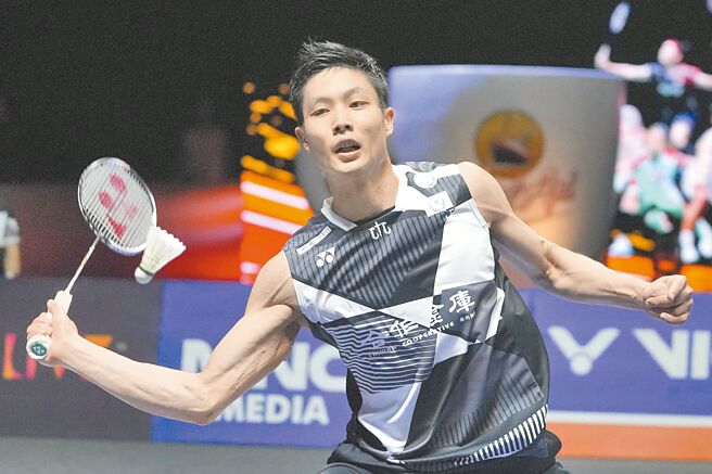 周天成8日在中国羽球大师赛男单闯过头关。（美联社资料照片）