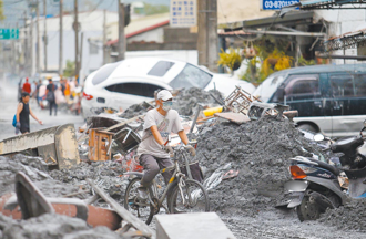 游毓兰专栏》两场天灾 两面镜子