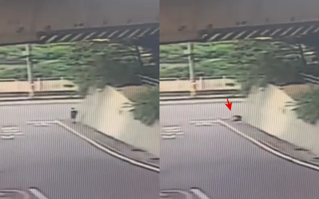 基隆一名学生未发现路面水沟盖遭翻开，下秒踩空摔伤。（图／记者爆料网）