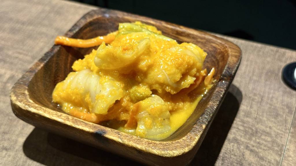 個人很推薦的黃金泡菜。(施景耀 攝)