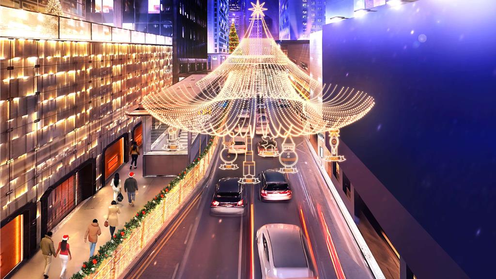遮打大廈與行人天橋掛滿璀璨燈飾，每晚五點亮燈後，整條遮打道化身金光閃耀的「星光長廊」  。(港旅局提供)    