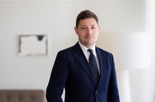 瑞士百達資產管理信用債券與另類固定收益客戶投資組合經理團隊主管Gareth Payne12日來台，分享聯準會降息後，固定收益迎來再配置的契機。(百達投顧提供／洪凱音台北傳真)