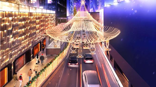 遮打大廈與行人天橋掛滿璀璨燈飾，每晚五點亮燈後，整條遮打道化身金光閃耀的「星光長廊」  。(港旅局提供)    